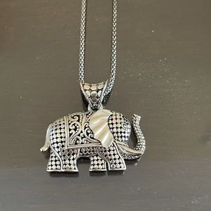 Silver elephant Ross Simon necklace.
